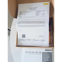Fluke 725 Multifunction Process Calibrator packaging box and accessories